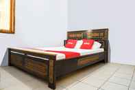 Kamar Tidur OYO 91016 Sandi Homestay