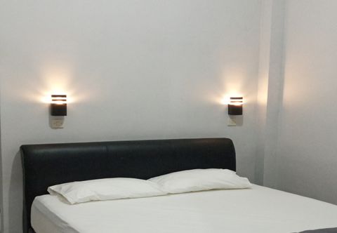 Bedroom EXPRESS O 91030 Penginapan Mutiara