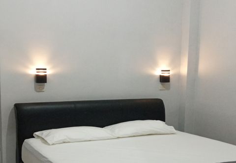 Bedroom EXPRESS O 91030 Penginapan Mutiara