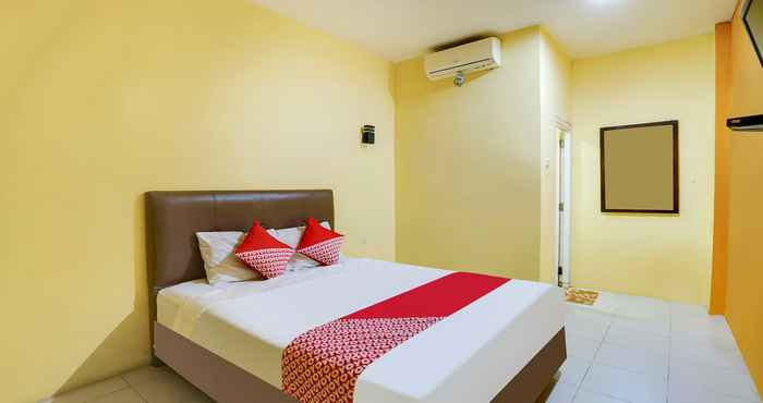 Kamar Tidur OYO 91027 Note Hotel Syariah