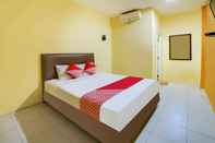 Kamar Tidur OYO 91027 Note Hotel Syariah