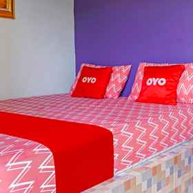 Bedroom 1 Capital O 91028 Grand Gelatik Hotel, Purwasari Hotels