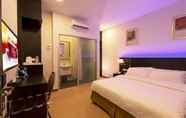 Kamar Tidur 7 E-Red Hotel Alma