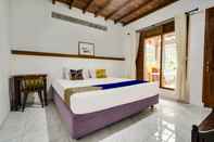 Bedroom OYO Homes 91056 Eco Tourism Desa Ciburial Syariah