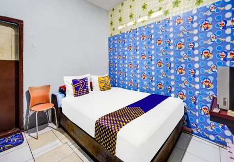 침실 OYO Life 91060 Villa Wijaya Homestay