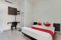 Phòng ngủ OYO 91031 Astu Homestay