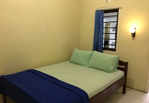 Bedroom OYO 90998 Wisma Pinggir