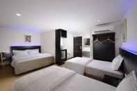 Bedroom E-Red Hotel Bayu Mutiara