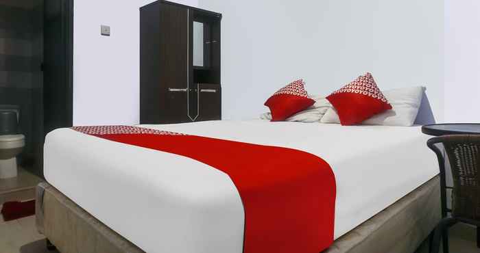 Bedroom OYO 91072 Enine Homestay Makassar