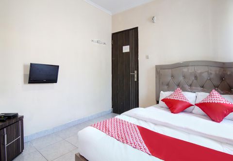 Bedroom OYO 91065 Guest House 19 Syariah