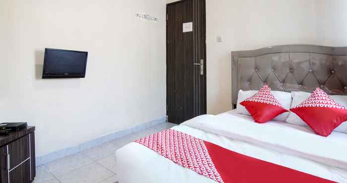 Bedroom OYO 91065 Guest House 19 Syariah