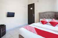 Bedroom OYO 91065 Guest House 19 Syariah