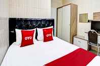 Kamar Tidur OYO 91619 Home 276 Syariah Sub