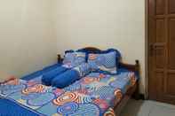 Kamar Tidur OYO Homes 91083 Desa Wisata Plosokuning Syariah