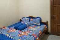 Bedroom OYO Homes 91083 Desa Wisata Plosokuning Syariah