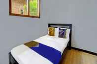Bedroom OYO Home 91087 Desa Wisata Edukasi Boon Pring Sanankerto