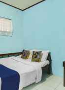 BEDROOM OYO Homes 91089 Desa Wisata Air Terjun Way Kalam Syariah