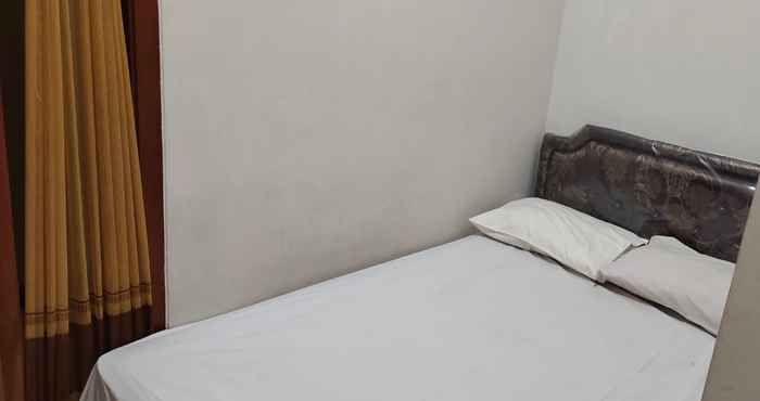 Kamar Tidur OYO 91099 Krukah Residence