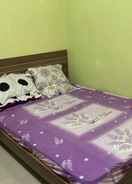 BEDROOM OYO Homes 91115 Desa Wisata Genilangit Magetan syariah