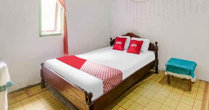 Bedroom SPOT ON 91148 Homestay Desa Wisata Bahoi
