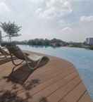 SWIMMING_POOL Signature 2BR 5pax Serviced Residence by Homebrickz 