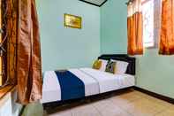 Kamar Tidur SPOT ON 91159 Kost Putrana Syariah