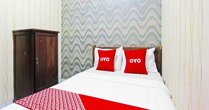 Bedroom OYO 91172 Trihakso Guesthouse