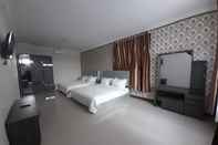 Bedroom Solok Premier Hotel
