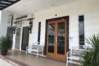 Bangunan OYO 90506 Z Stay Inn Hotel