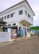 EXTERIOR_BUILDING OYO 872 Villa Tomasa Beach Resort