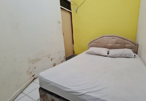 ห้องนอน OYO 91200 Wisma Gio Amanda