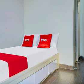 Bedroom 1 SPOT ON 91205 リンダン ゲストハウス シャリア, PT INDO MAKLON NATURAL KOSMETIKA ホテル