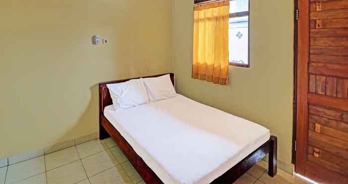 Bedroom OYO 91208 Suana Guest House