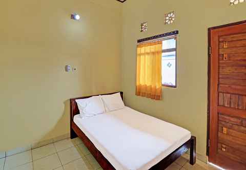 Bedroom OYO 91208 Suana Guest House