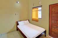 Bilik Tidur OYO 91208 Suana Guest House