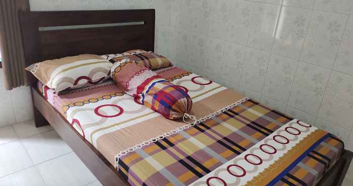 Kamar Tidur OYO 91233 Bismo 85 Family Syariah