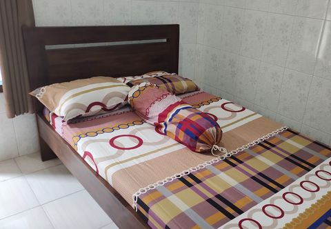 침실 OYO 91233 Bismo 85 Family Syariah