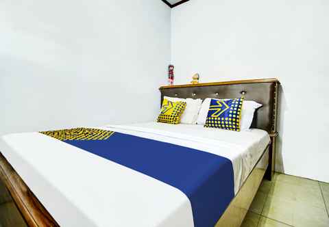 Bedroom OYO HOMES 91242 Desa Wisata Cibuntu Kuningan