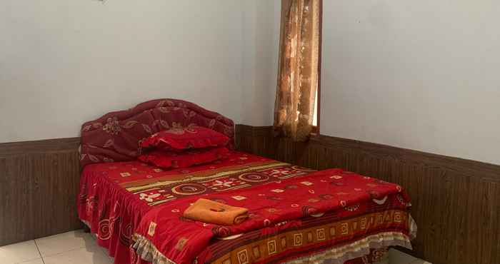 Bedroom OYO 91263 Dinar Homestay