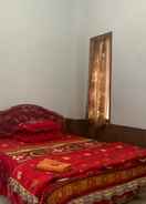 BEDROOM OYO 91263 Dinar Homestay