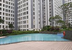 Swimming Pool 4 Fancy and Cozy Studio Apartment at M-Town Residence By Travelio