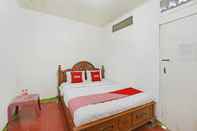 Phòng ngủ SPOT ON 91270 Hotel Arimbi