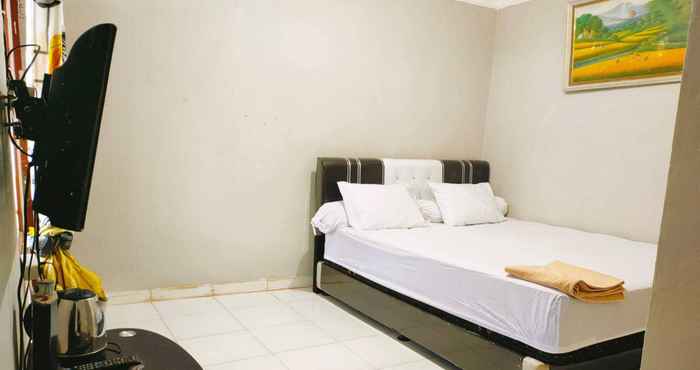 Kamar Tidur EXPRESS O 91277 Atiq Homestay Syariah