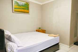 Kamar Tidur 4 EXPRESS O 91277 Atiq Homestay Syariah