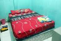 Bedroom EXPRESS O 91281 Guest House Indah Jaya