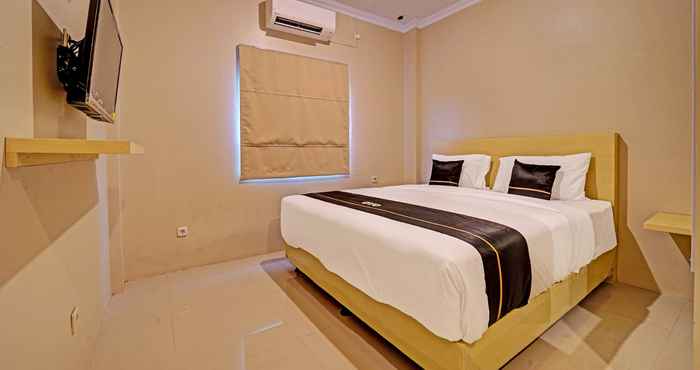 Bedroom SUPER OYO Collection O Andono Hotel by GWA