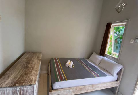 Bedroom EXPRESS O 91294 Bali Surya Surfcamp