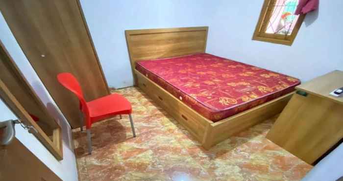Bedroom SPOT ON 91343 Kartika Guest House Syariah