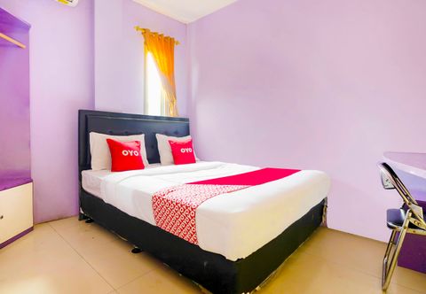 Bedroom OYO 91299 Violet Guest House
