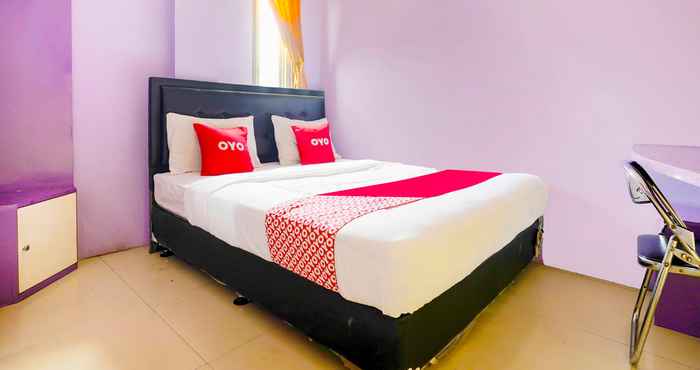 Kamar Tidur OYO 91299 Violet Guest House